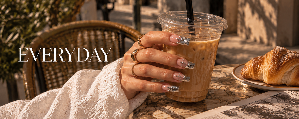Everyday press-on nails – hand with nude chrome nails holding an iced coffee – Briluxe