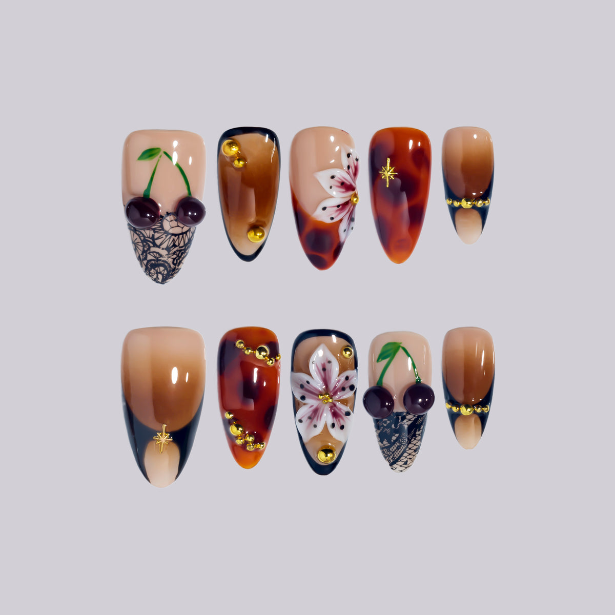 Cherry Latte medium almond press-on nails, tortoiseshell with cherry accents – Briluxe
