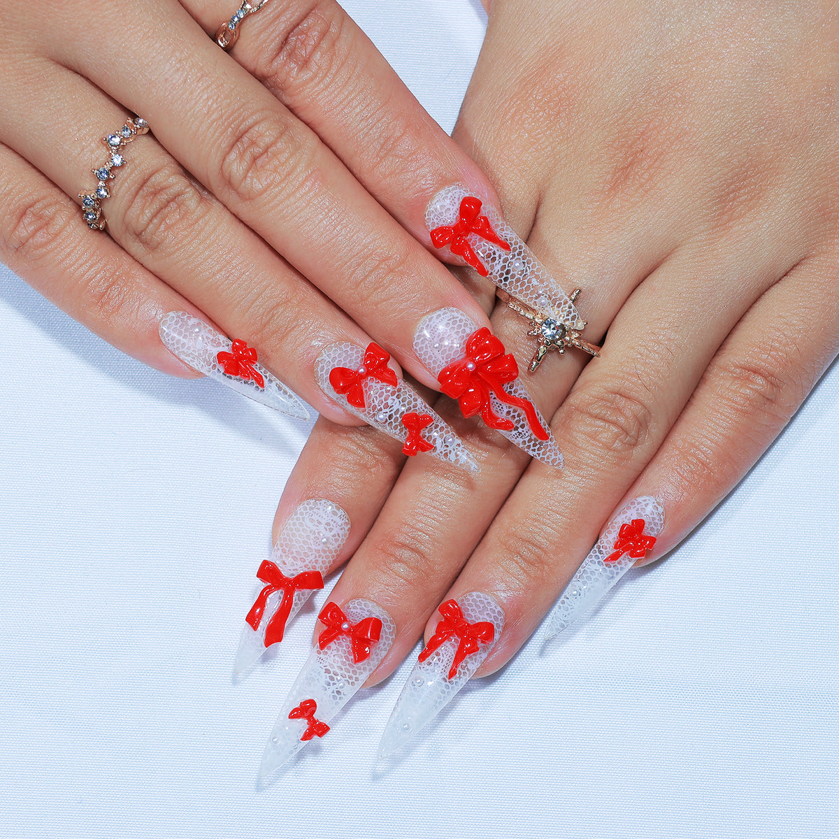 Ribbon Trouble long stiletto press-on nails, lace with red 3D bows – Briluxe (view 3)