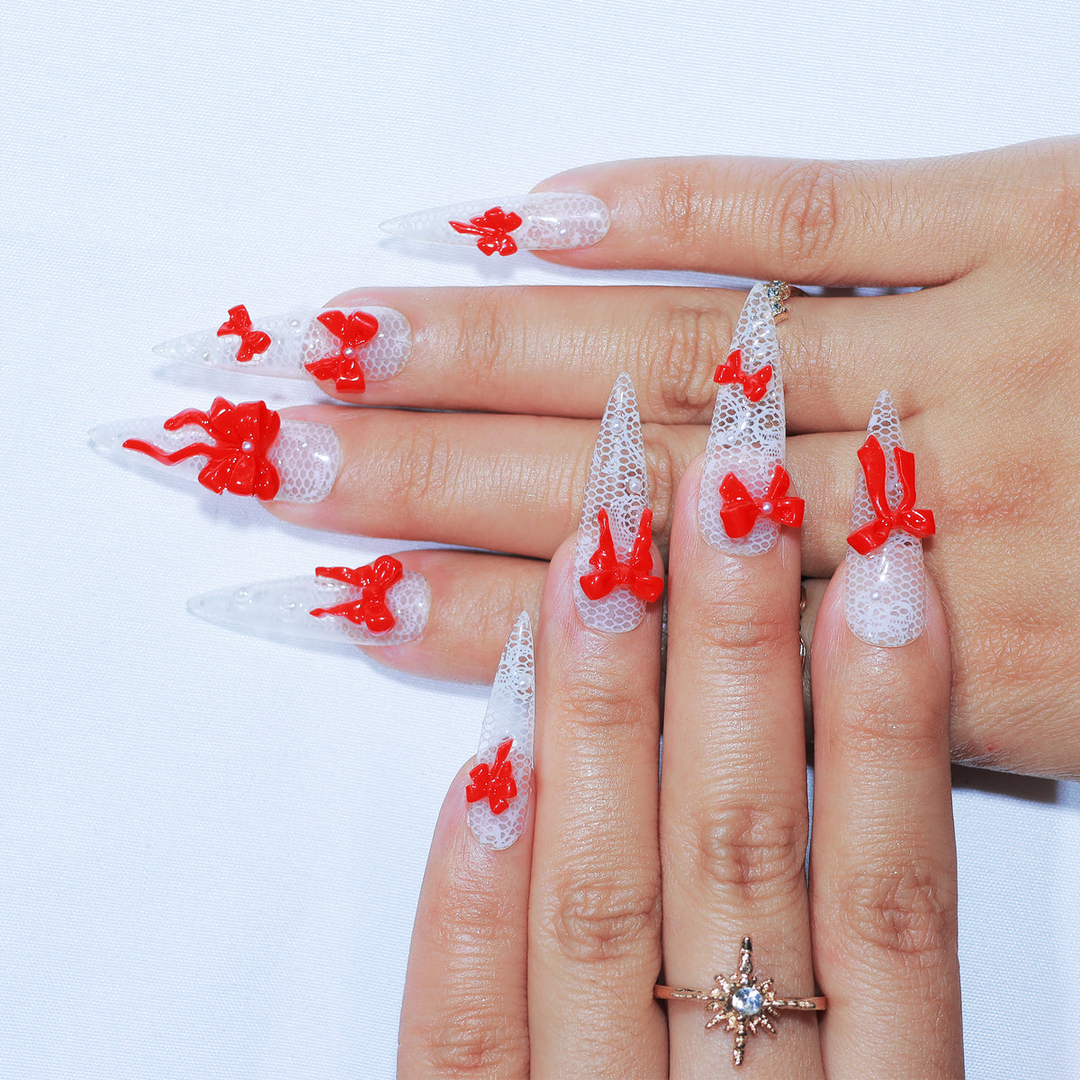 Ribbon Trouble long stiletto press-on nails, lace with red 3D bows – Briluxe (view 2)