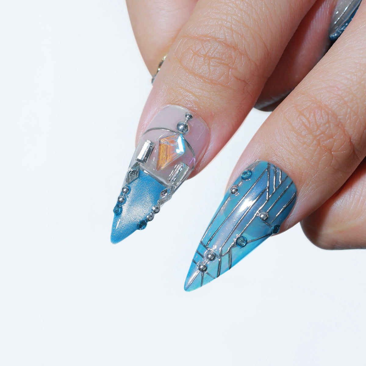 Cyber Siren long stiletto press-on nails, blue-silver chrome with 3D gem – Briluxe (view 5)