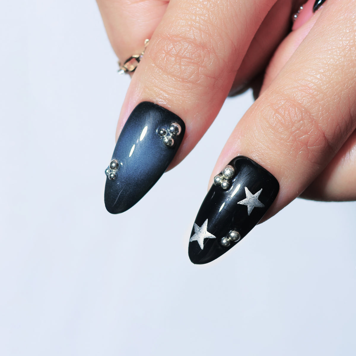 Star Driver medium almond press-on nails, nude and chrome with star details – Briluxe (view 5)