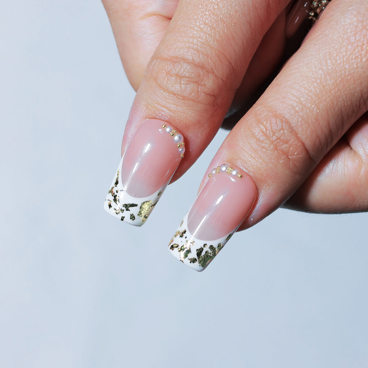 Saint Rouge medium square press-on nails, burgundy French tips with gold crosses – Briluxe (view 5)