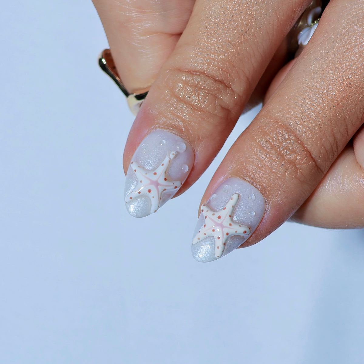 Sea Muse short almond press-on nails, pearl white with shell texture – Briluxe (view 5)