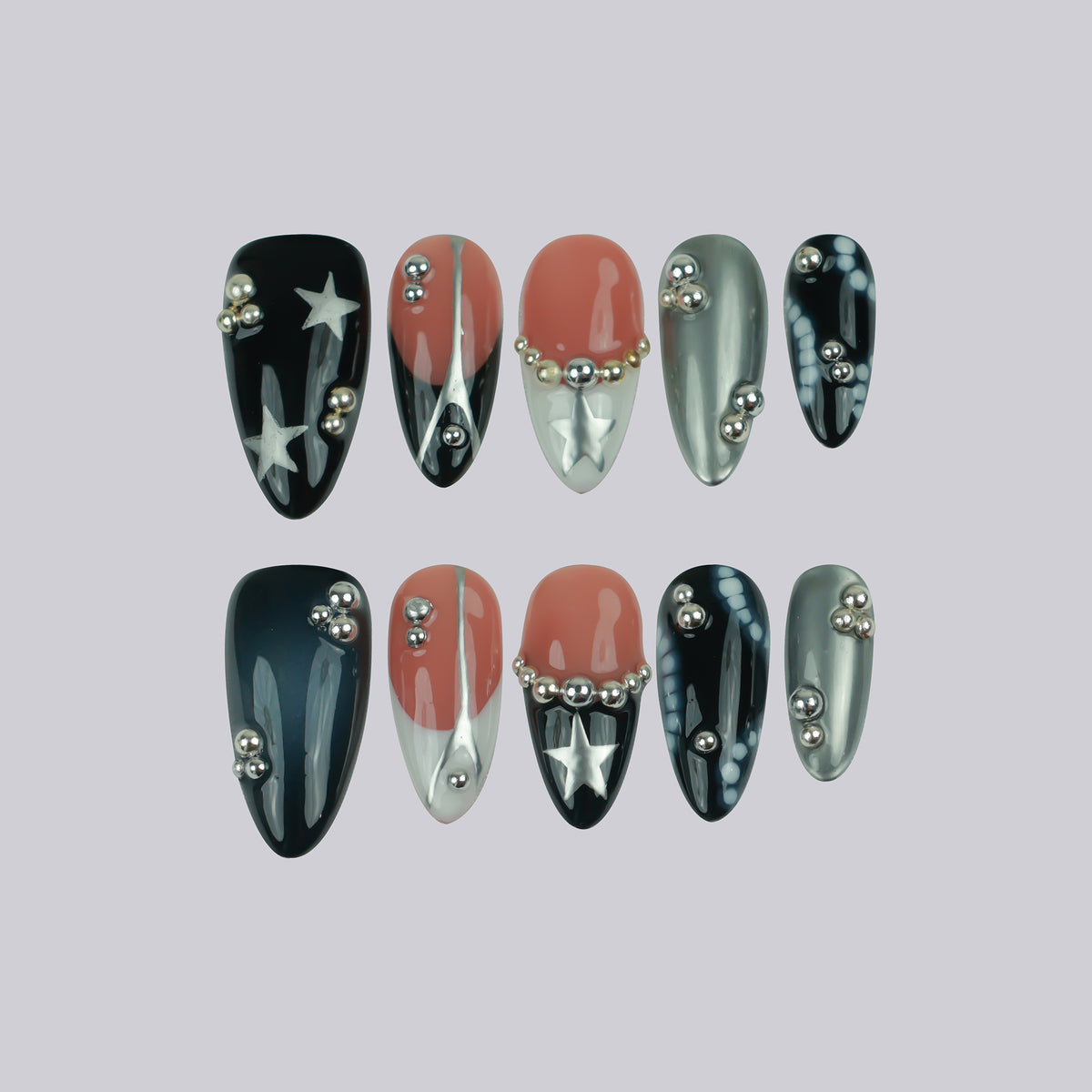 Star Driver medium almond press-on nails, nude and chrome with star details – Briluxe